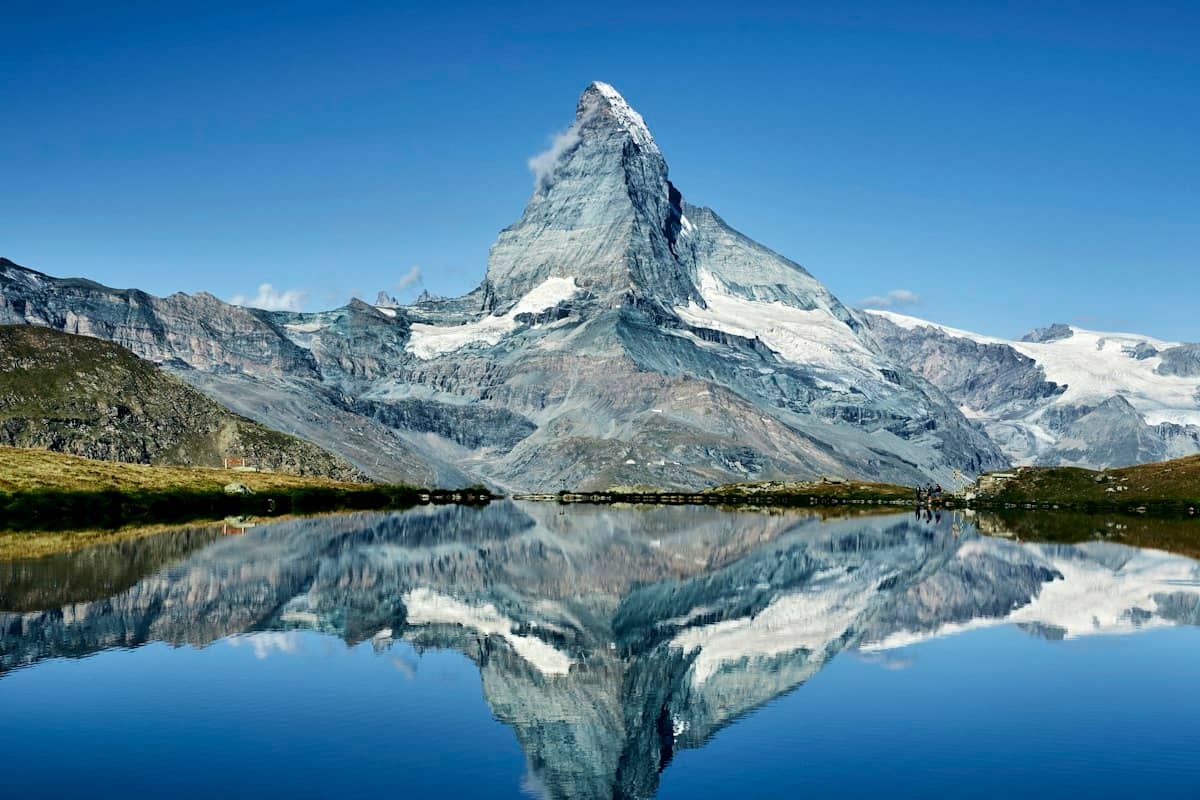 The Matterhorn reflected in an alpine lake above Zermatt